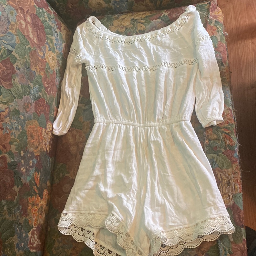 I’m selling a white romper.  like new wore a couple times. It got small for me